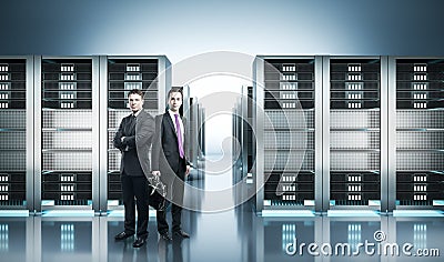 Businessmen in server room Stock Photo