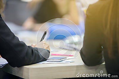 Businessmen are signing financial contracts An Official Document Stock Photo