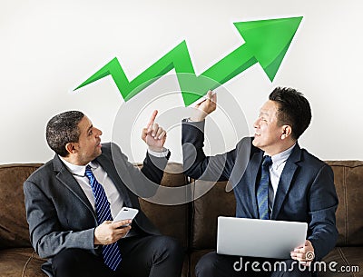 Businessmen sitting together with icons Stock Photo