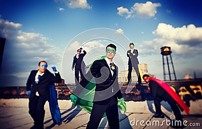 Businessmen in superhero costume Stock Photo