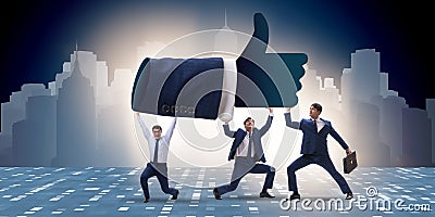 The businessmen supporting thumbs up gesture Stock Photo
