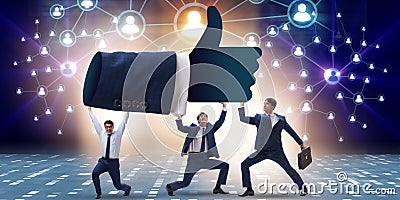 The businessmen supporting thumbs up gesture Stock Photo