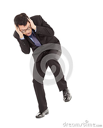 Businessmen terrified to hands over his ears Stock Photo