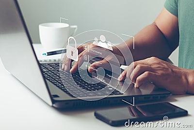 Businessmen type login and password to protect personal data on laptop and virtual interfaces. Cybersecurity and privacy concepts Stock Photo