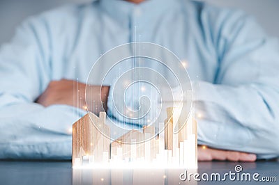 Businessmen use a handle on the wooden block to show stock graphs and rising stock signals with chart indicators. Concepts of Stock Photo