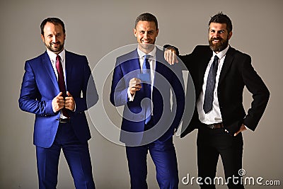 Businessmen wear smart suits and ties. Business and presentation concept. Stock Photo