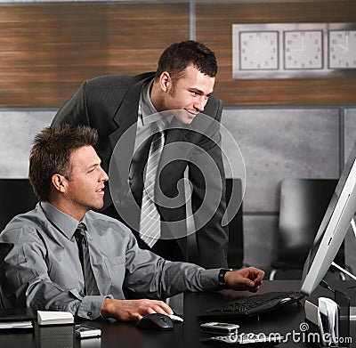 Businessmen working with computer Stock Photo