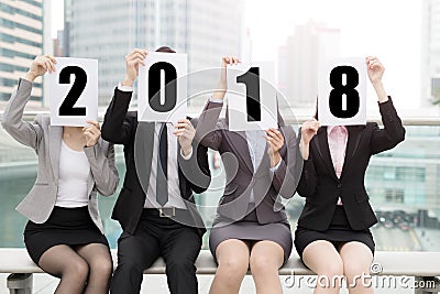 2018 businesspeople with billboard Stock Photo