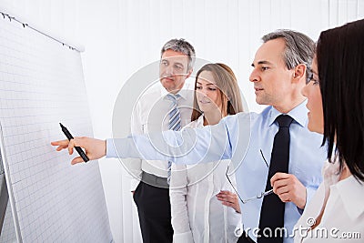 Businesspeople discussing project Stock Photo