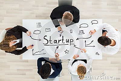 Businesspeople Making Startup Plan Stock Photo