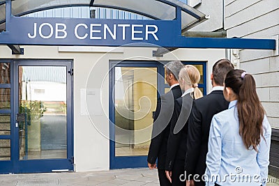 Businesspeople Outside The Job Center Stock Photo