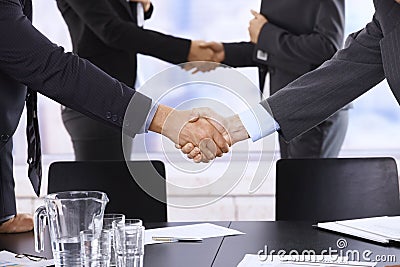 Businesspeople shaking hands Stock Photo