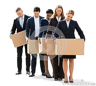 Businesspeople Standing With Cardboard Boxes Stock Photo