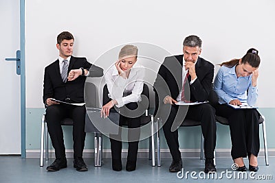 Businesspeople Waiting For Job Interview Stock Photo