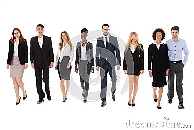 Businesspeople Walking On White Background Stock Photo