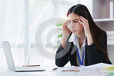 Businessperson have anxiety and stress and pressure with many financial document paperwork on desk, deadline, upset Stock Photo