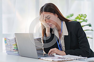 Businessperson have anxiety and stress and pressure with many financial document paperwork on desk, deadline, upset Stock Photo