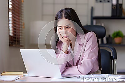 Businessperson have anxiety and stress and pressure with many financial document paperwork on desk, deadline, upset Stock Photo