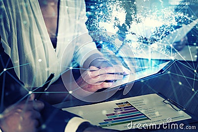 Businessperson in office connected on internet network with tablet. concept of partnership and teamwork Stock Photo