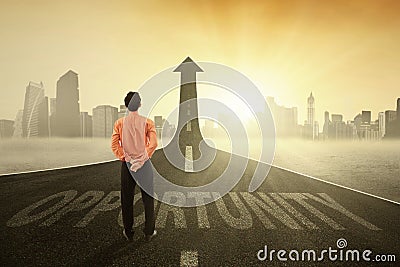 Businessperson on the opportunity road Stock Photo