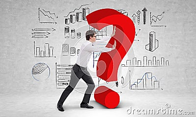 Businessperson pushing question mark Stock Photo