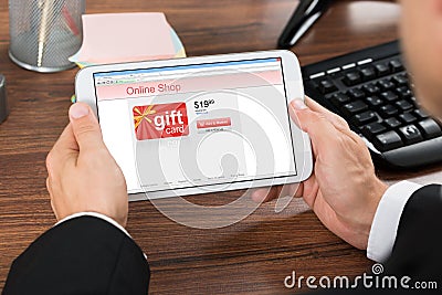 Businessperson shopping online with mobile phone Stock Photo