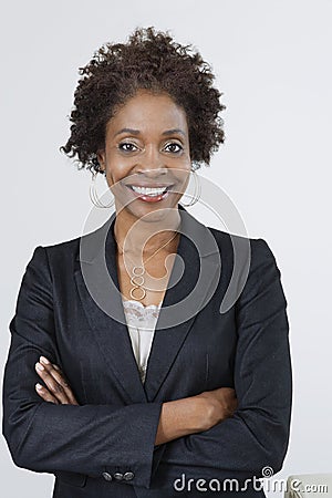 Businesswoman With Arms Crossed Stock Photo