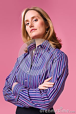 Businesswoman with arms folded Stock Photo
