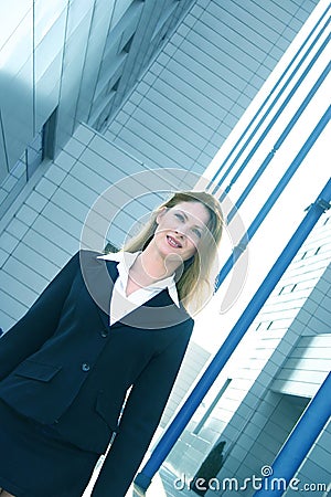 Businesswoman In Black Suit Angled Blue Tint Stock Photo