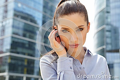 Businesswoman with Bluetooth Stock Photo