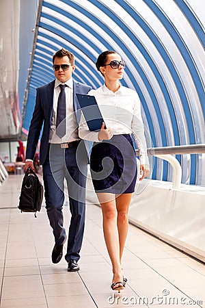 Businesswoman and a bodyguard Stock Photo