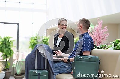 Businesswoman and businessman communicate and discuss business project Stock Photo