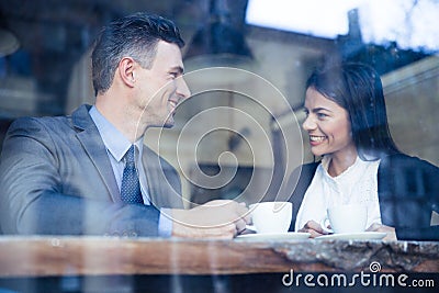 Businesswoman and businessman having coffee break Stock Photo