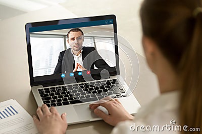 Businesswoman calling businessman online by video chat pc app, c Stock Photo