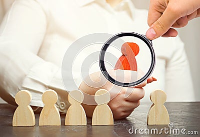 Businesswoman choose a person from the crowd. Team management. Employee selection. Human resources. Talented worker. Choose a new Stock Photo