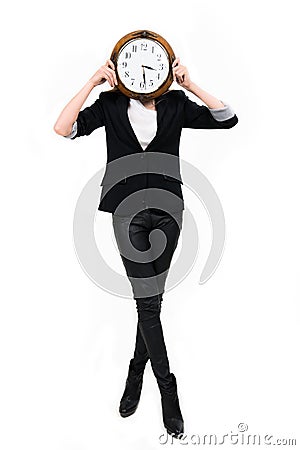 Businesswoman with clock ful height - time concept Stock Photo