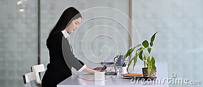 Businesswoman concentrate working on computer tablet at office. Stock Photo