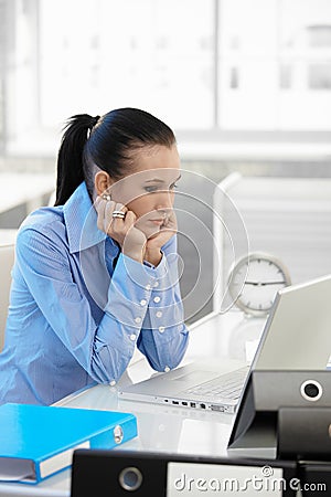 Businesswoman concentrating on computer work Stock Photo