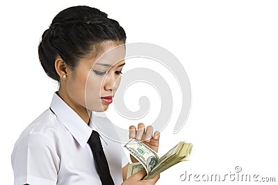 Businesswoman counting money Stock Photo