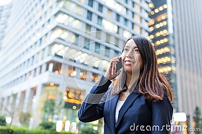 Businesswoman discuss on cellphone Stock Photo