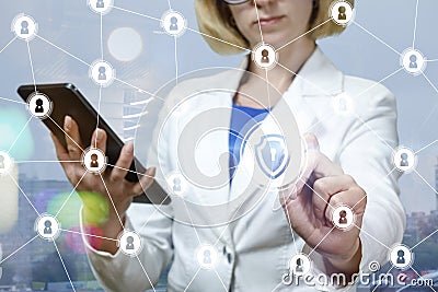 Businesswoman draws a secure network. Stock Photo