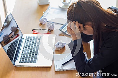 Businesswoman feeling stress from work. Stock Photo
