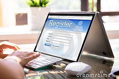 Businesswoman Filling Online Registration Form Stock Photo