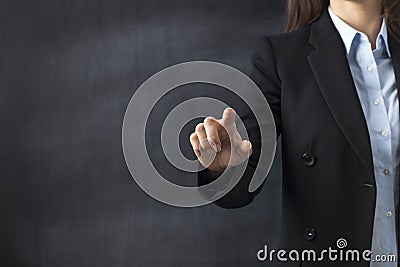 Businesswoman front of Blackboard Stock Photo