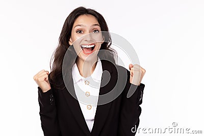 Businesswoman gets surprised, happiness for winning lotto, lottery or executive female win auction of big project. Caucasian Stock Photo