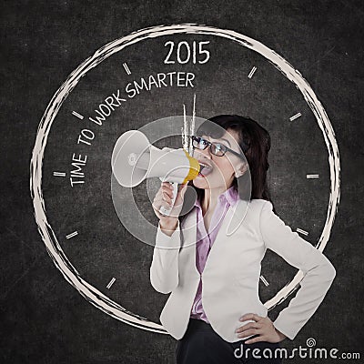 Businesswoman give order to work smarter Stock Photo