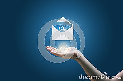 In businesswoman hand the envelope with the electronic message . Stock Photo