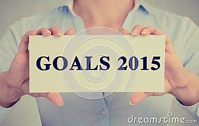 Businesswoman hands holding sign with goals 2015 text message Stock Photo