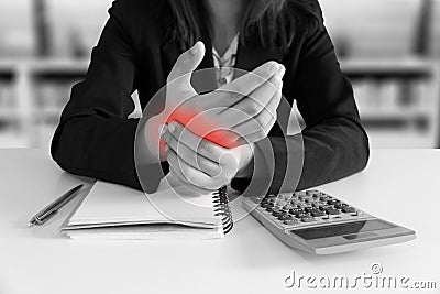 Businesswoman hands pain on desk office syndrome concept with no Stock Photo