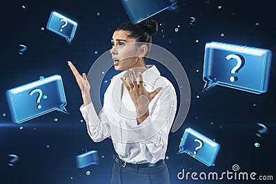 Businesswoman with hands raised in question, question marks floating, concept of inquiry Stock Photo